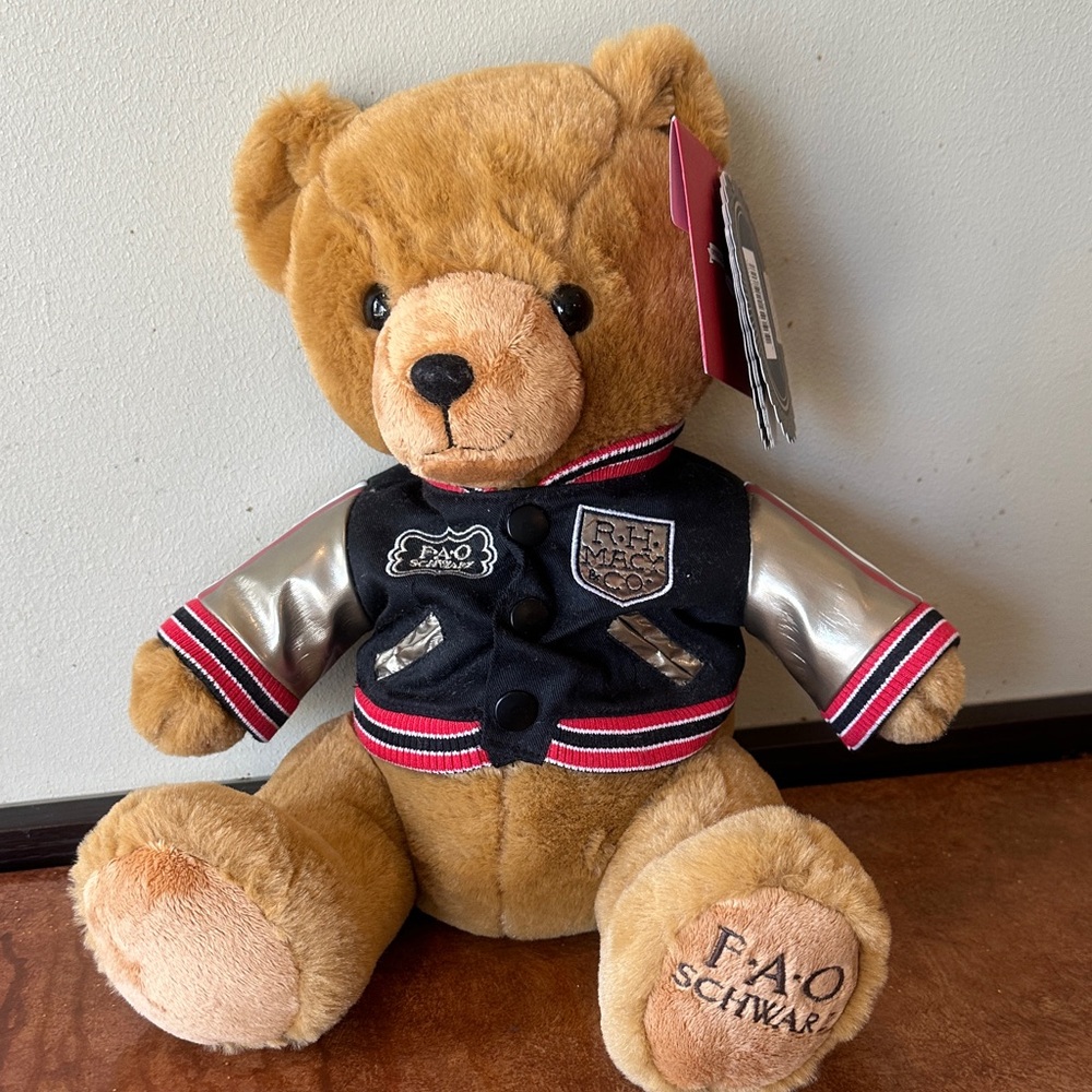 FAO Schwarz Tan Teddy Bear with Silver and Black Jacket
